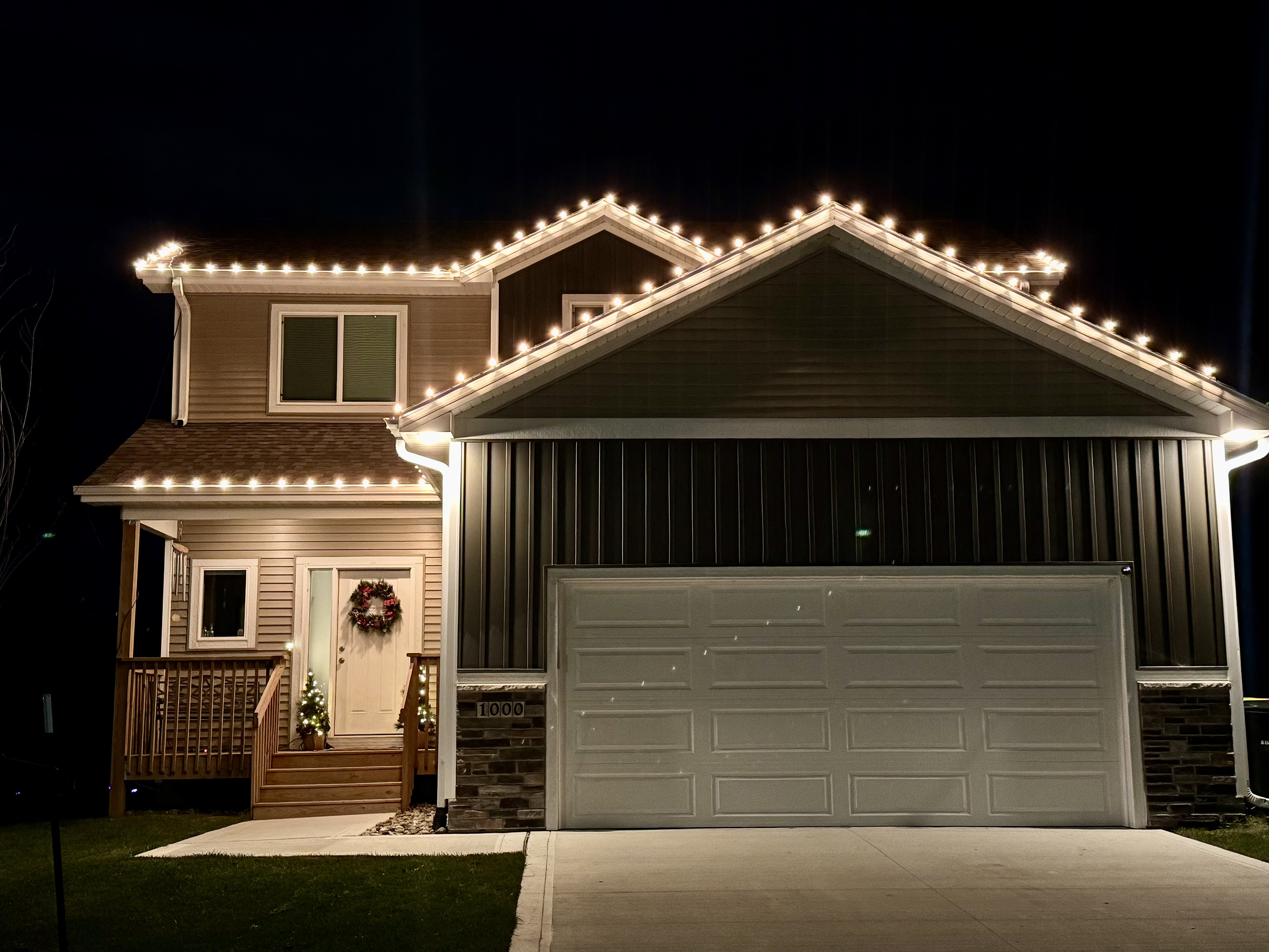 C9 classic warm white bulbs on a two story home