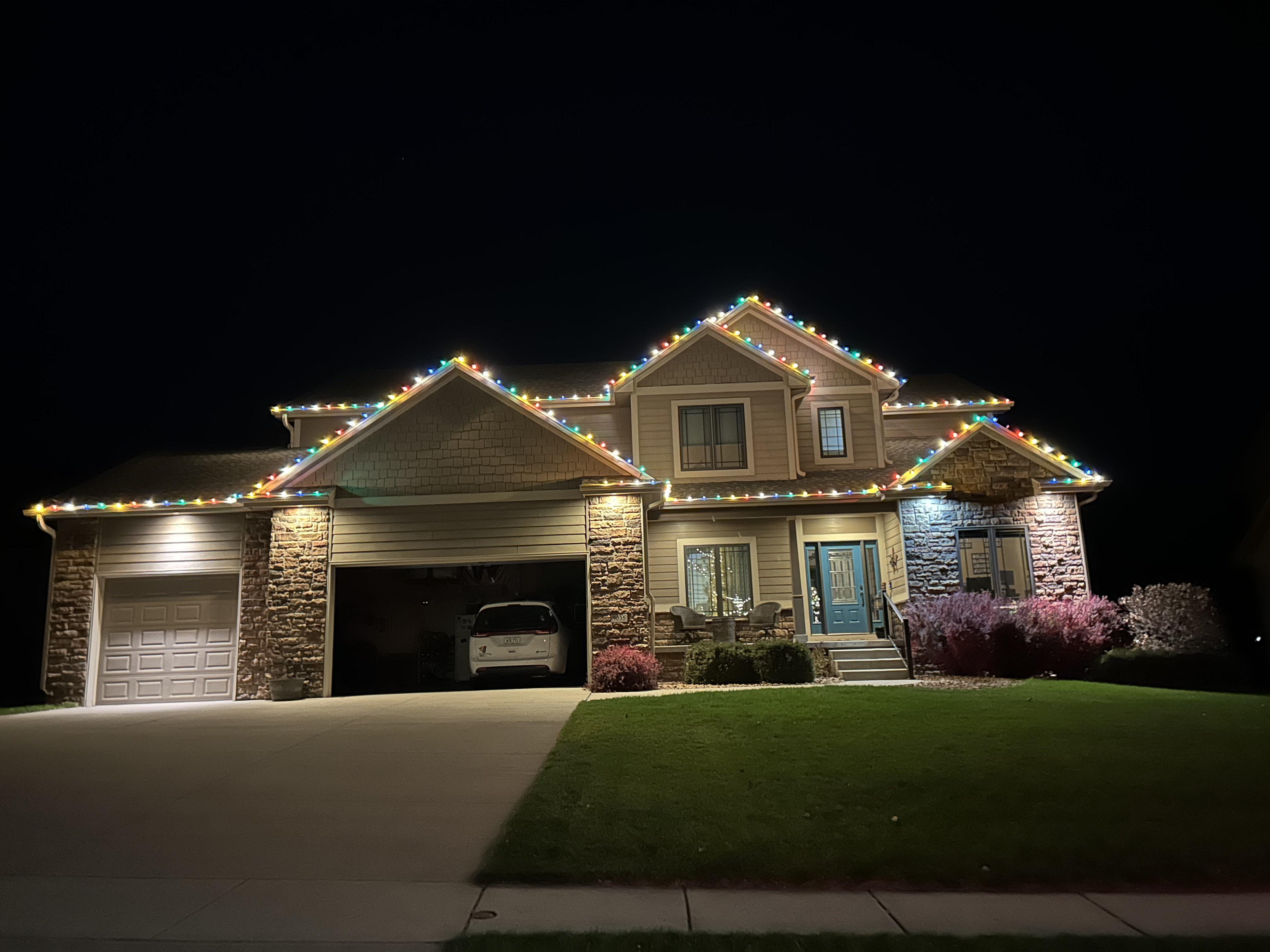 Large corner home with ridge lighting